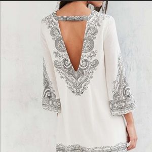 white and black écote dress